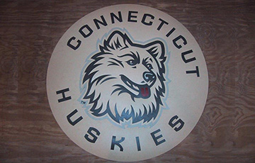 connecticut huskies logo on linoleum tile
